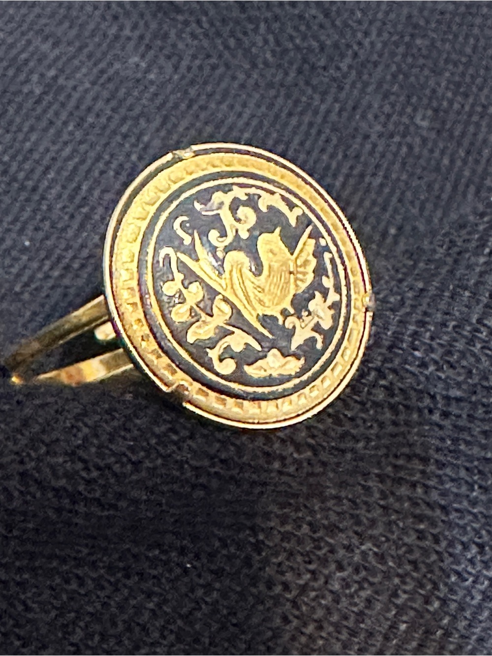 Vintage Spanish Toledo Damascene ring featuring a gold-inlaid bird and flora